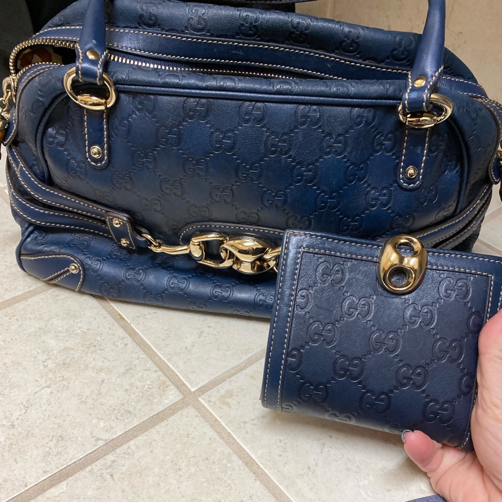 Gucci - blue leather embossed purse